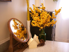 Berry Heavy Gold winterberry and Arctic Fire Yellow dogwood in a countertop arrangement.